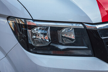 Closeup shot of the headlight of a nice car