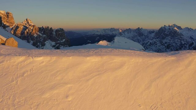 First-person view reaveal of Croda dei Toni e Cima d'Auronzo at dusk, Dolomiti di Sesto. Italy