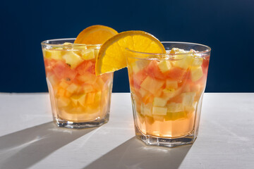 Sangria cocktail with white wine and fresh fruit