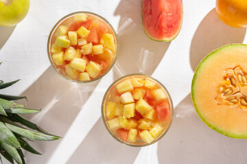 Sangria cocktail with white wine and fresh fruit