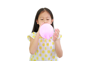 Asian little child girl blowing pink balloon isolated on white background