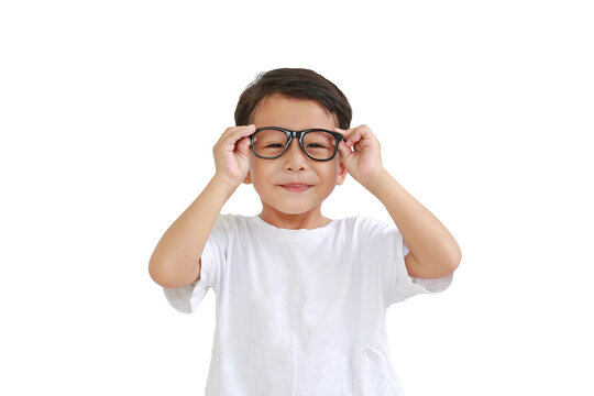 Portrait of funny asian little boy child wearing glasses isolated on white background