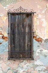 The weathered architecture of colonial buildings in Cuba