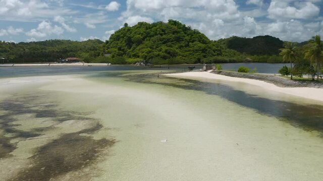 Aerial showing old broken bridge at Doot Beach nearby General Luna, Siargao Island, Philippines.