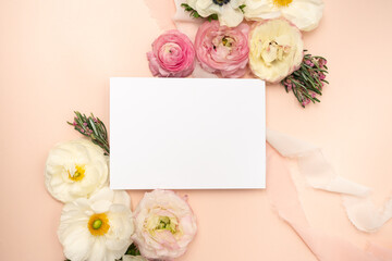 Fototapeta na wymiar Beautiful floral flat lay with blank card