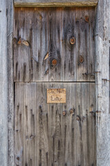 Do not enter sign on a rustic farm barn door