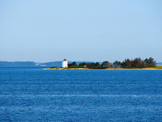 Small lighthouse on the coast Baagoe Bågø Island Funen Denmark
