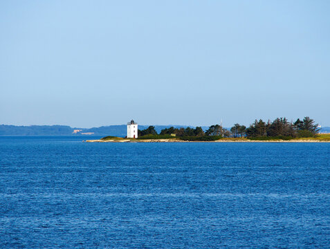 Small lighthouse on the coast Baagoe B&aring;g&oslash; Island Funen Denmark