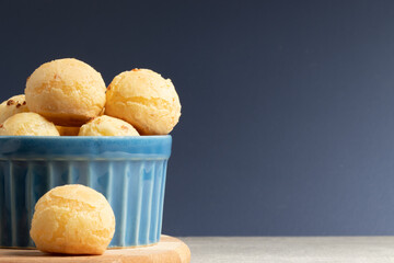 Brazilian snack cheese bread close up, space copy.