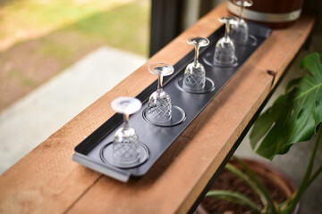 Blur wine glass on wine bar.