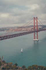 bridge of lisbon in the middle of the river