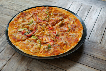 Delicious chicken pizza that is still warm