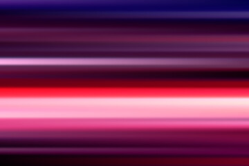 Speed colorful light trails with motion blur of night lights.