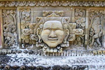 detail of the wall carving in Bali Indonesia temple