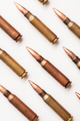 A group of bullet ammunition shells on a white background