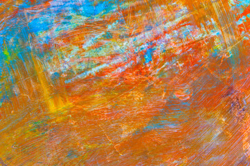 colorful creative motley background: smudged residues of oil paints on a wooden palette, short...