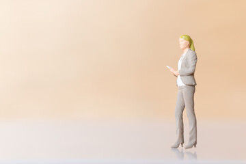 Miniature Business people standing and copy space for text