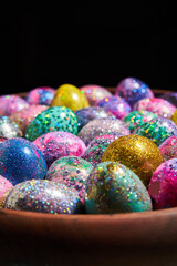 Many colorful shiny eggs. Concept of Happy Easter.