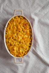 Homemade Macaroni and Cheese Pasta on cloth, top view. Flat lay, overhead, from above. Copy space.