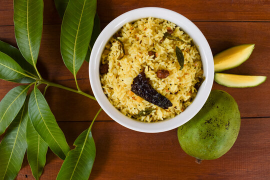 Delicious mango rice or mamidikaya pulihora homemade prepared during ugadi or gudipadwa festival. Special raw mango rice dish for ugaadi festival