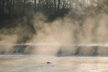 Vents waterfall in the fog, Kuldiga, Latvia