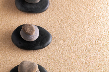 Fototapeta na wymiar Japanese zen garden meditation stone in sand