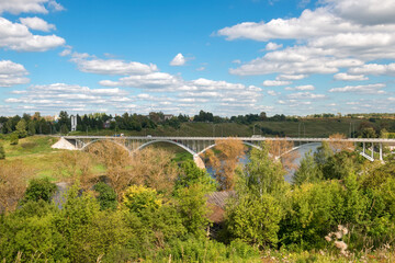 Fototapeta premium The view at the bridge across the Volga river in the town of Staritsa, Russia
