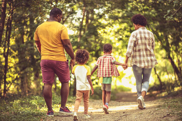 African American family having fun outdoors.