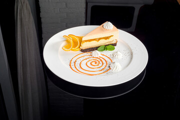 One slice of fruit cheesecake on a white plate