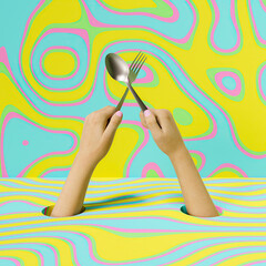 hands holding a spoon and fork in cross with colorful background