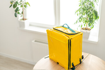 Yellow refrigerator bag for food delivery or for trip to nature and tourism. Thermo bag that keeps food from spoiling