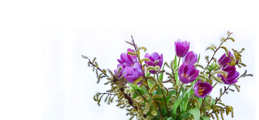 Birthday card with a bouquet of purple tulips on a white background.