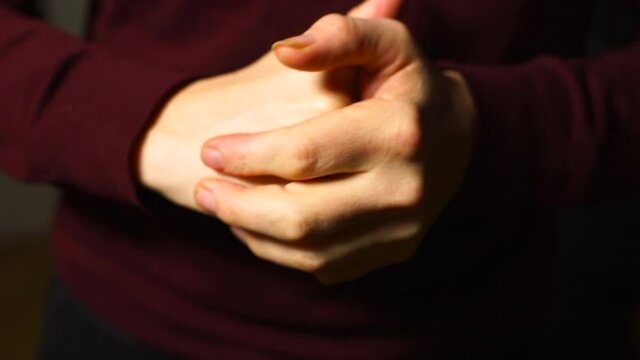 Hand gestures. expression of excitement and anxiety before an important event. Basically, the impression is formed by your movement, costume. Close-up.