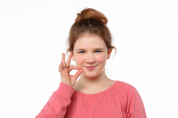 Your secrets safe with me concept. Young girl showing zip gesture as if shutting mouth on key