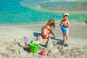 happy child playing by the sea outdoors