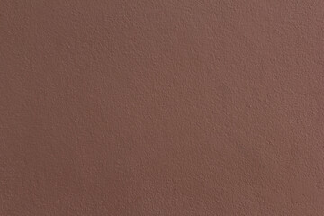 Dark brown concrete wall A blank background for the text. Copy space