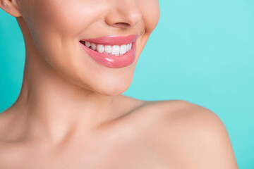 Cropped photo of young happy cheerful toothy beaming woman with perfect white teeth isolated on turquoise color background