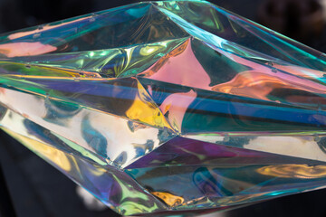 A neon-colored object with a complex structure. Three-dimensional ornament