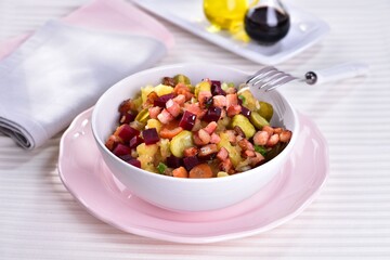 Potato salad with red beet