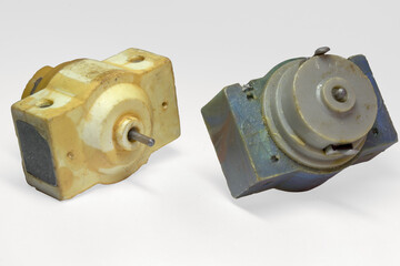 mini DC motor, two-pin, 12V. Pair of vintage parts of micro electronic constructor and toys. with clipping path for easy isolation