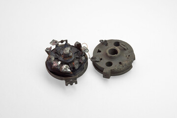 disassembled spare part of old appliances. vintage 9-pin socket, with separated lid and solder...