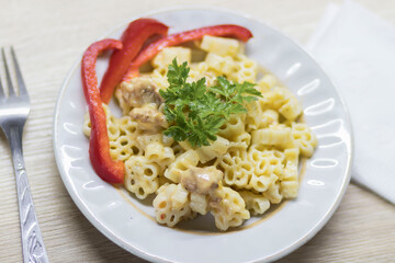 Macaroni and cheese, on the kitchen table