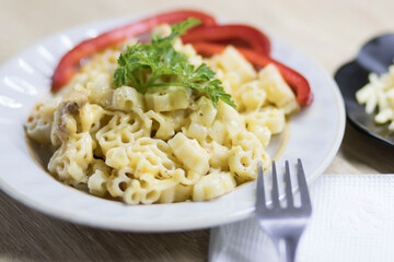 Macaroni and cheese, on the kitchen table
