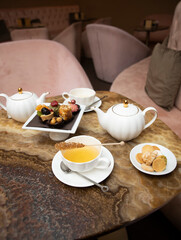 selective focus. Tea time with cake and cookies and cane sugar . Breakfast time. 
