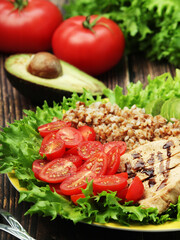 Turkey breast, avocado, salad and buckwheat as healthy lunch