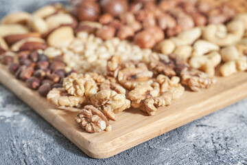 Different nuts. Home kitchen. Protein and fat food. Mix seeds. Raw whole snack. Munchies. Natural cuisine. Vegan. Hazelnut