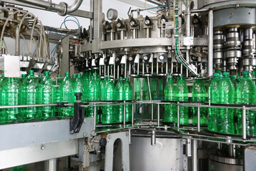 Water bottling in plastic at beverage factory