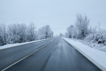 Fototapeta na wymiar A country road in winter