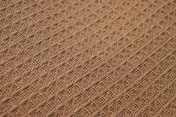Beige brown waffle textile pattern material, fabric woven clothing 