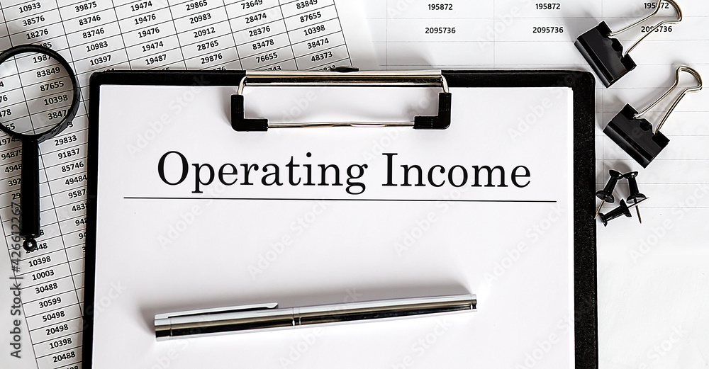 Poster paper with operating income on a table chart